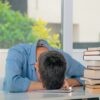 勉強で疲れた外国人男性